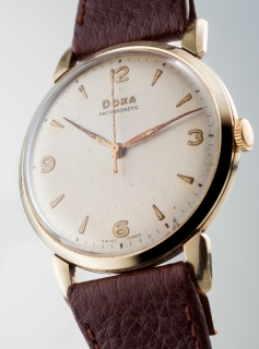 Zlaté hodinky, Doxa